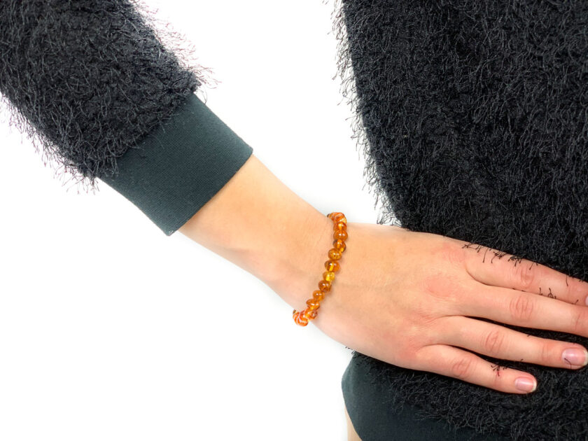 honey color amber bracelet on arm
