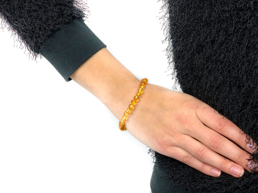 lemon color baltic amber bracelet on arm