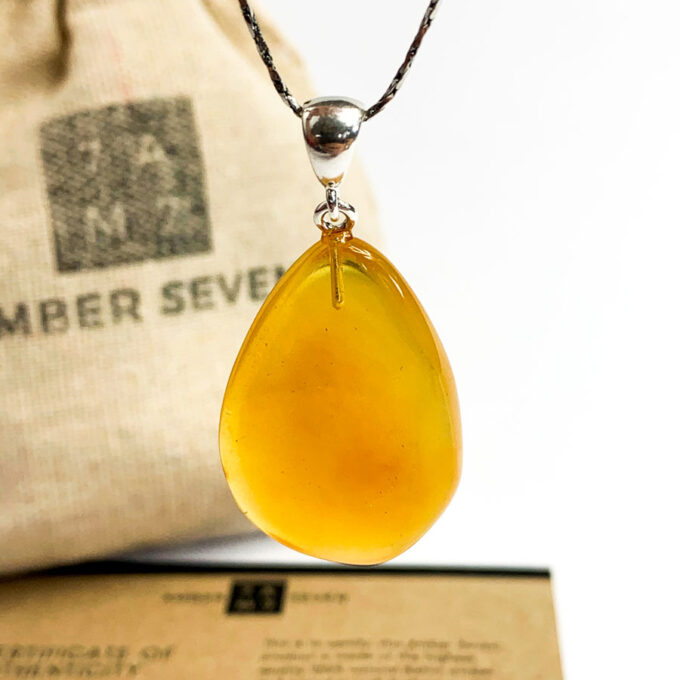 egg yolk color amber teardrop pendant with silver